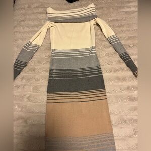 Sweater dress 
Fits beautifully 
Hugs curves